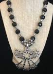 Black Crystal and Silvertone Necklace with Angel Pendant 