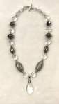Crystal and Silvertone Necklace with Crystal Teardrop Pendant 
